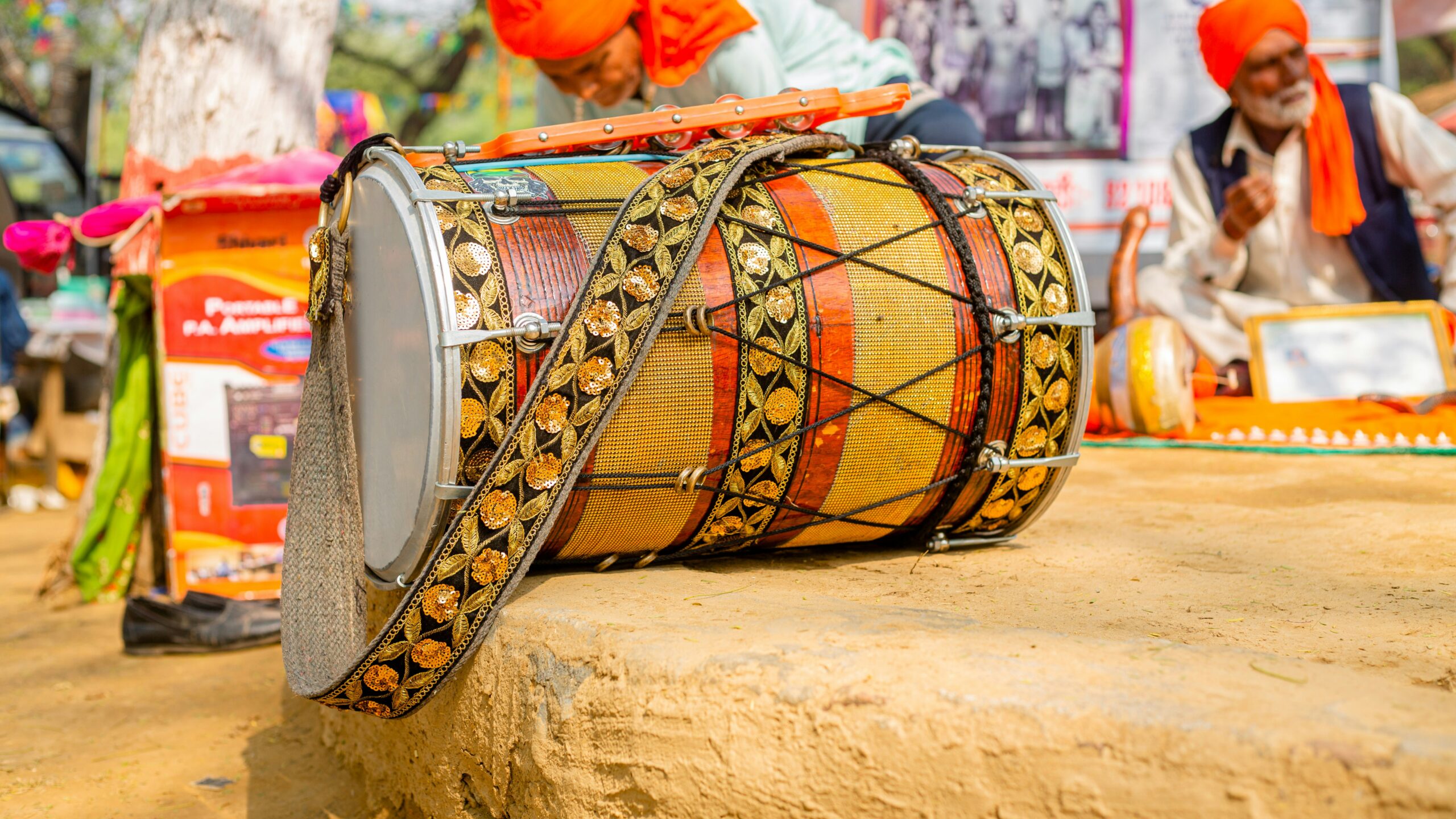 a drum sitting on top of a wooden table