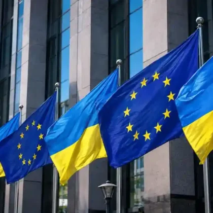 European Union flags representing the new Ukraine war aid package from Russian asset profits.