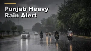 ਮੀਂਹ ਵਿੱਚ ਲੰਘਦੇ ਰਾਹਗੀਰ, Punjab Heavy Rain Alert ਦੌਰਾਨ ਦੀ ਪ੍ਰਤੀਕਾਤਮਕ ਤਸਵੀਰ